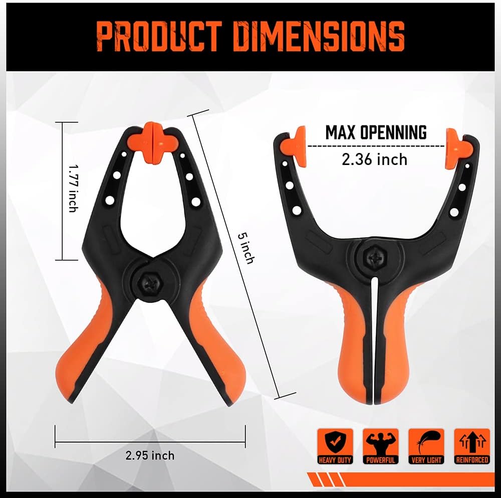 Heavy duty 5-inch orange and black spring clamps with flexible jaw pads and ergonomic handles for woodworking, DIY, and backdrop support