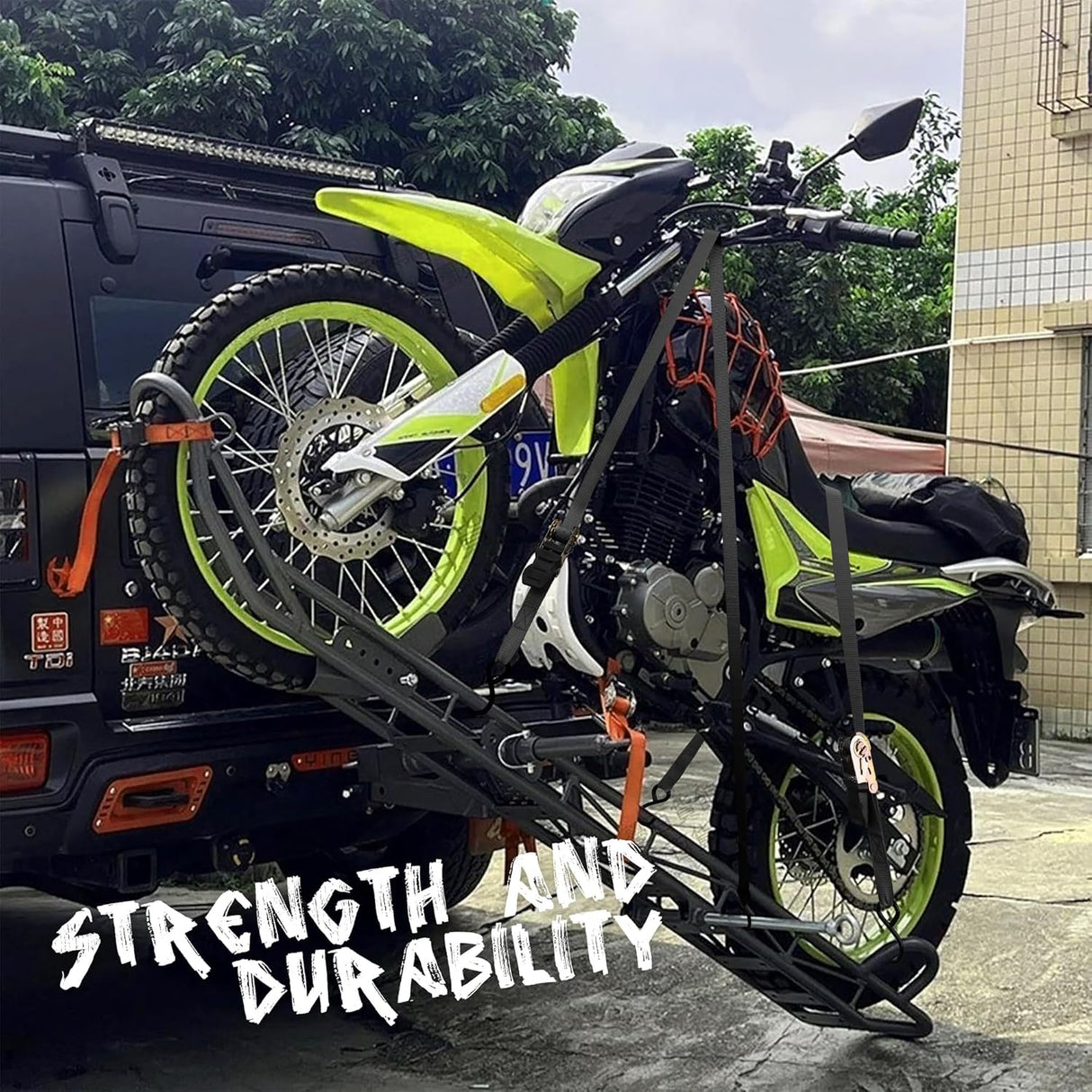 Heavy-duty ratchet tie down strap set with ergonomic handles, coated S-hooks, and bungee cords for secure cargo transport