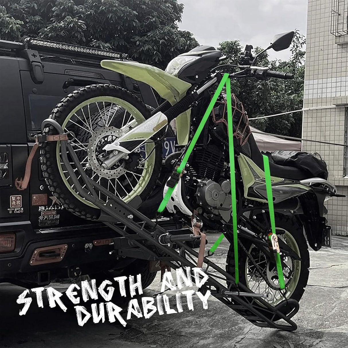 Heavy-duty ratchet tie down strap set with ergonomic handles, coated S-hooks, and bungee cords for secure cargo transport