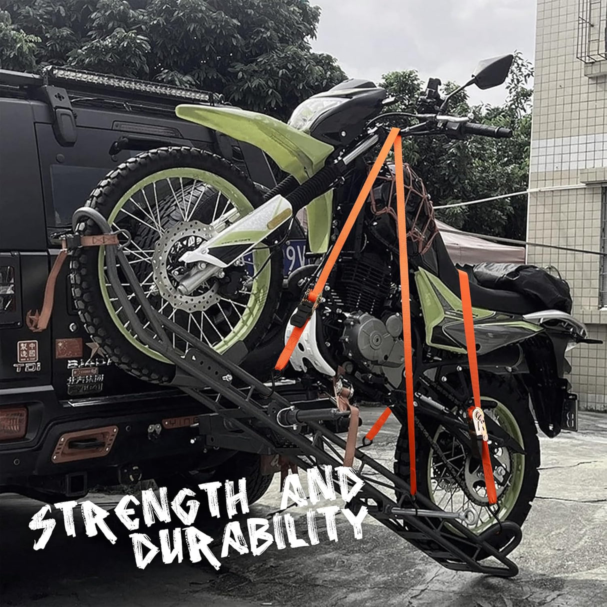 Heavy-duty ratchet tie down strap set with ergonomic handles, coated S-hooks, and bungee cords for secure cargo transport