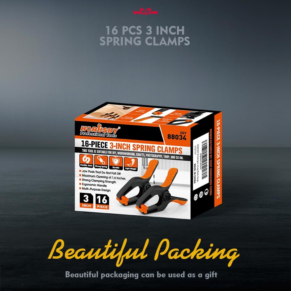 3-inch orange and black heavy duty spring clamps with soft rubber handle and flexible non-slip jaw pads for woodworking, crafts, and photography use